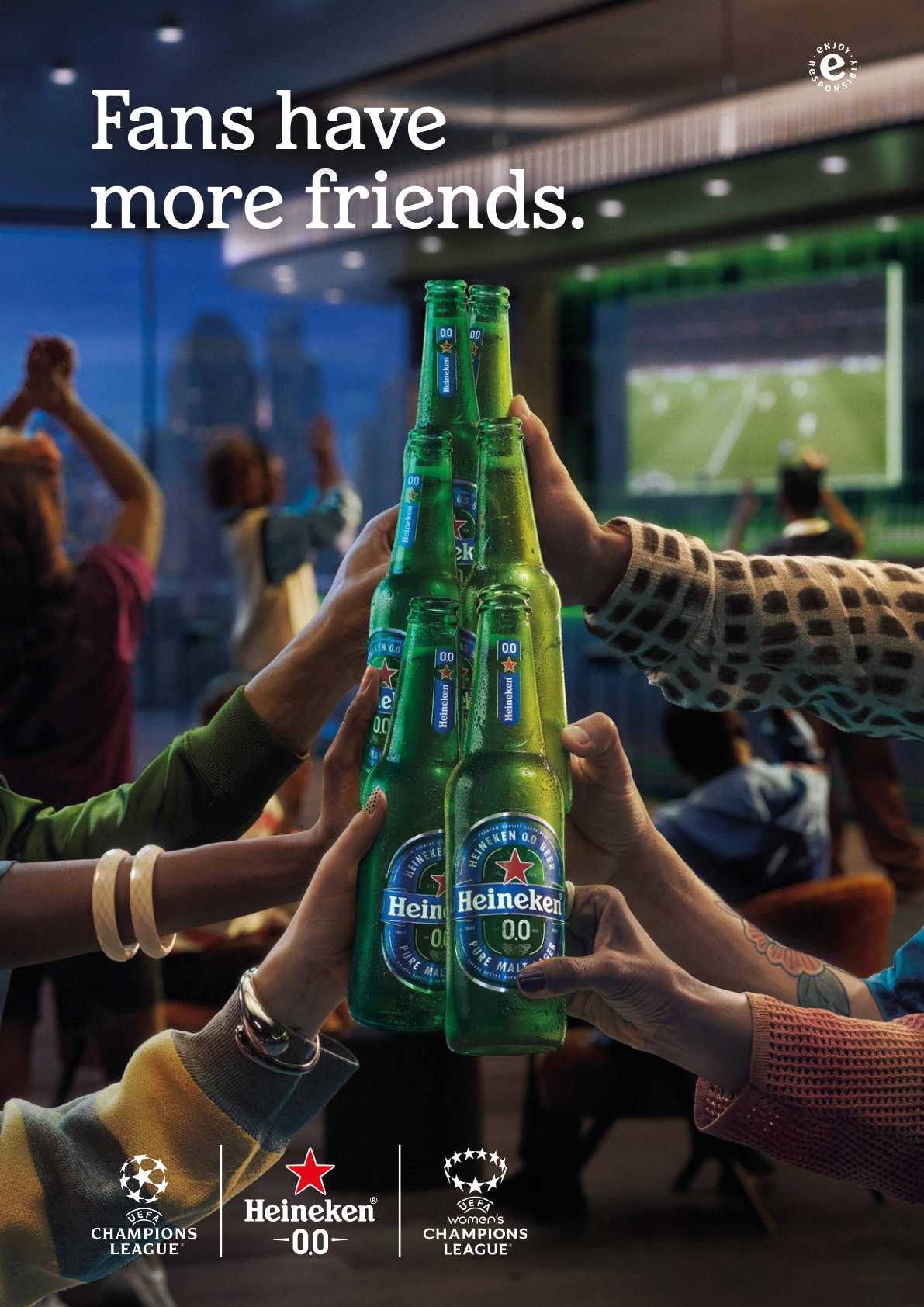 A group of people holding up green bottles of beer. Description generated by AI