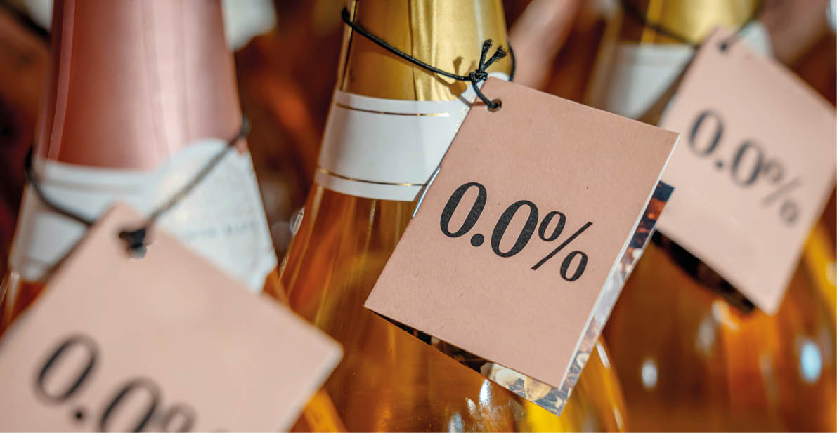 A bottle of wine with a 0% sign on it. Description generated by AI