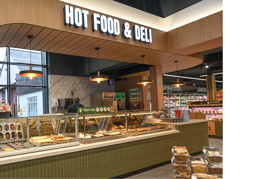 A deli counter with a variety of foods on display. AI generated content