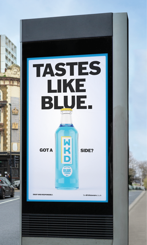 A billboard for a blue drink with a white and blue sign. Description generated by AI