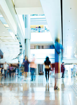 People rushing in the lobby. motion blur