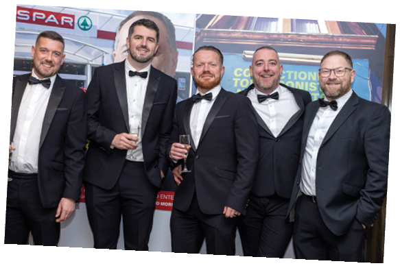 A group of men in suits and ties. Description generated by AI