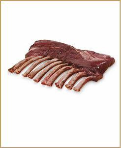 A raw rack of lamb with exposed ribs resting on a white surface. Description generated by AI