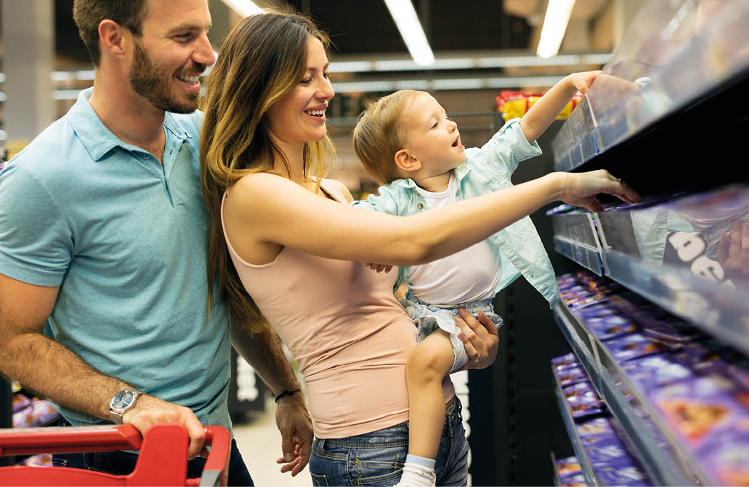 Family shopping in their local supermarket.