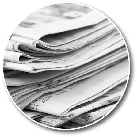 A stack of newspapers is shown, with the top one being the largest. AI generated content