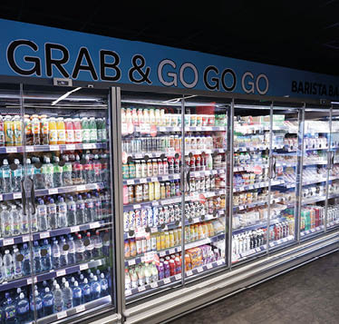 A refrigerator filled with various drinks and bottles. AI generated content