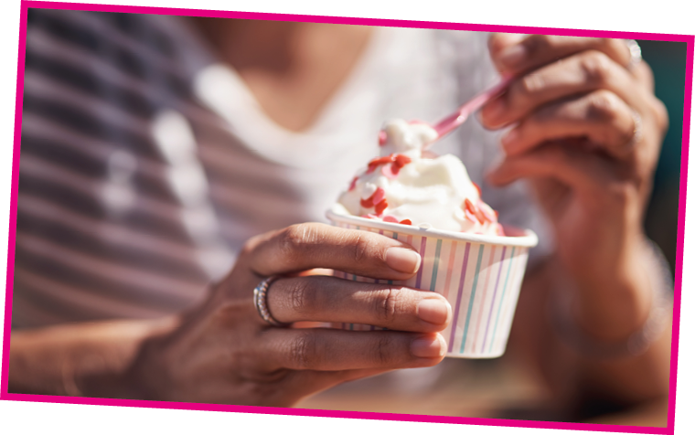 A person is eating a dessert from a cup. AI generated content