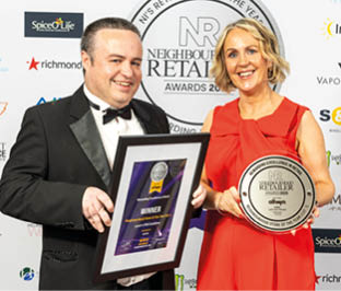 A man and woman are holding a framed award. AI generated content