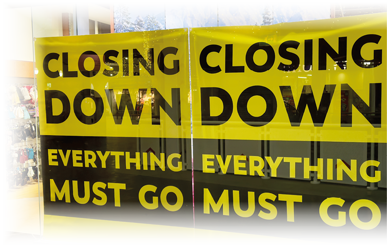 A yellow sign with black letters reads “closing down everything must go." AI generated content