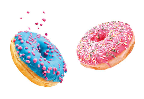 Fresh sweet donuts in motion with multicolored fruit glaze and sprinkles decorated. Fast sweet food concept, bakery ad design elements with glazed frosted falling doughnuts isolated, white background