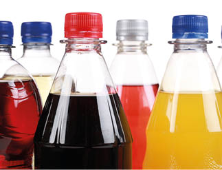 Bottles with soft drinks, isolated on a white background