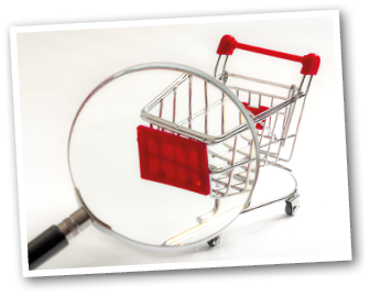 A magnifying glass is on a shopping cart. Description generated by AI