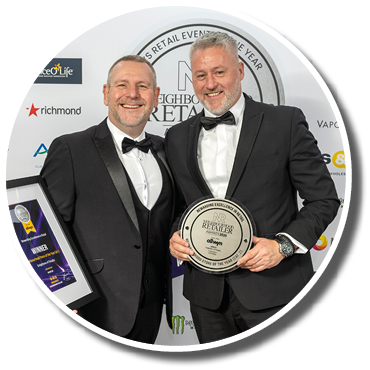 Two men holding awards. Description generated by AI