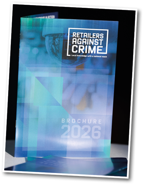 A blue and white display with the words Retailers Against Crime. Description generated by AI