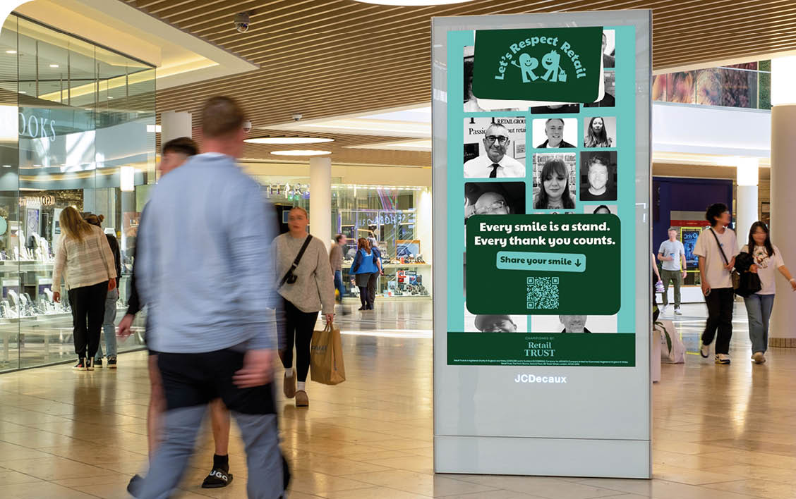 A large screen with a green background and white text. Description generated by AI