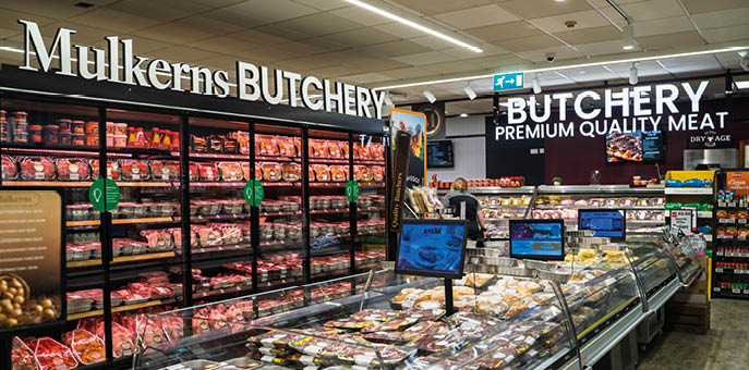 A butcher shop with a large display of meat. Description generated by AI