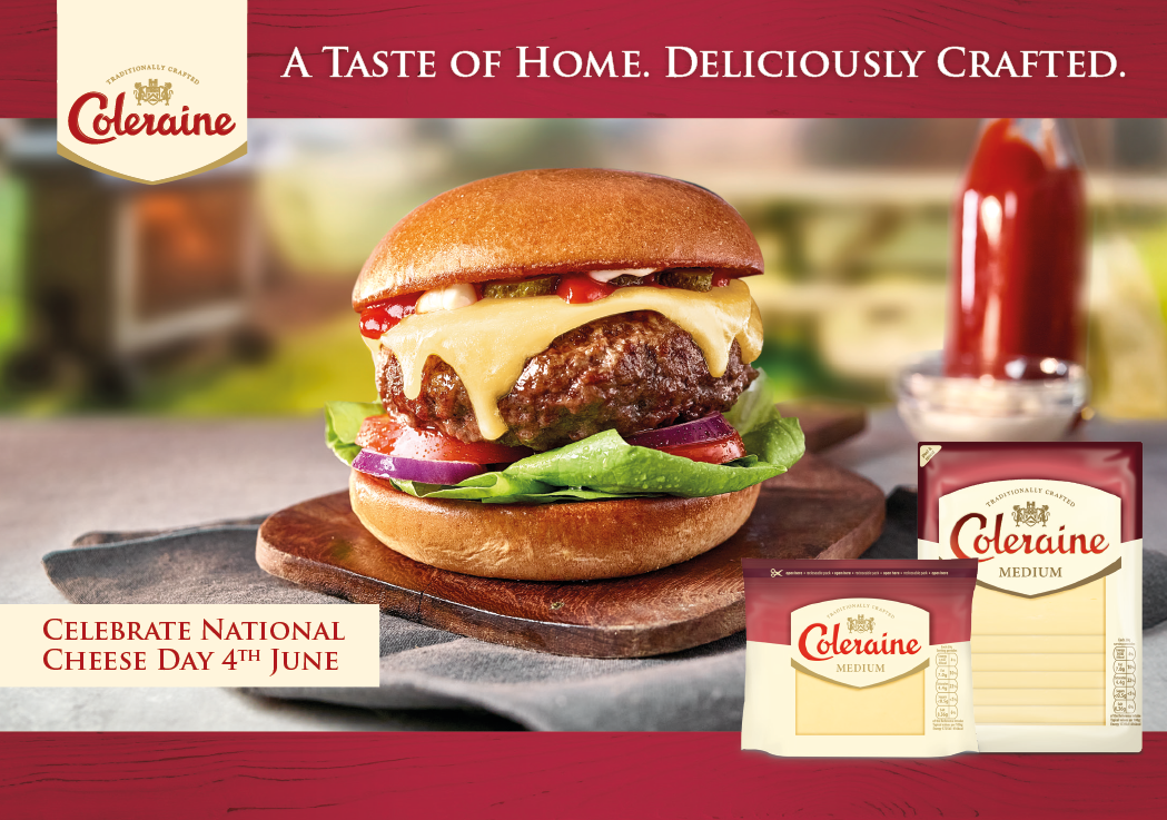 A cheeseburger with lettuce and tomato on a bun. Description generated by AI