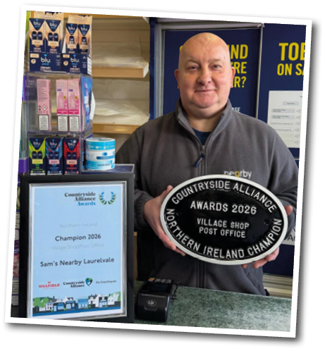 A man holding a trophy in a store. Description generated by AI