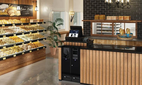 A bakery counter with a variety of breads and pastries. Description generated by AI
