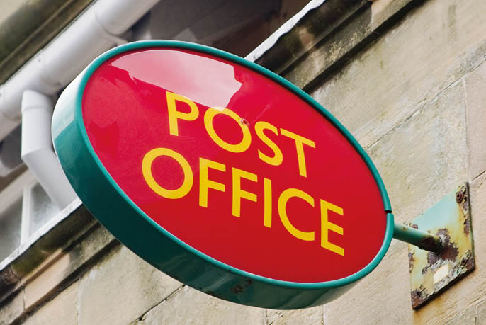 Post Office sign on the wall
