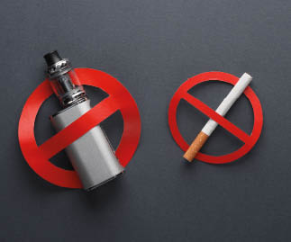 Vaping device and Cigarette with a prohibition sign on dark background. Smoking ban