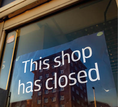 'This shop has closed' sign- one of many high street shops closing down due to bad economic climate