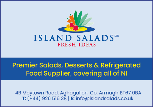 Island Salads Ltd logo with a colorful fruit and vegetable graphic above text advertising premier salads, desserts, and refrigerated food supplier covering all of Northern Ireland, including contact details and address. Description generated by AI