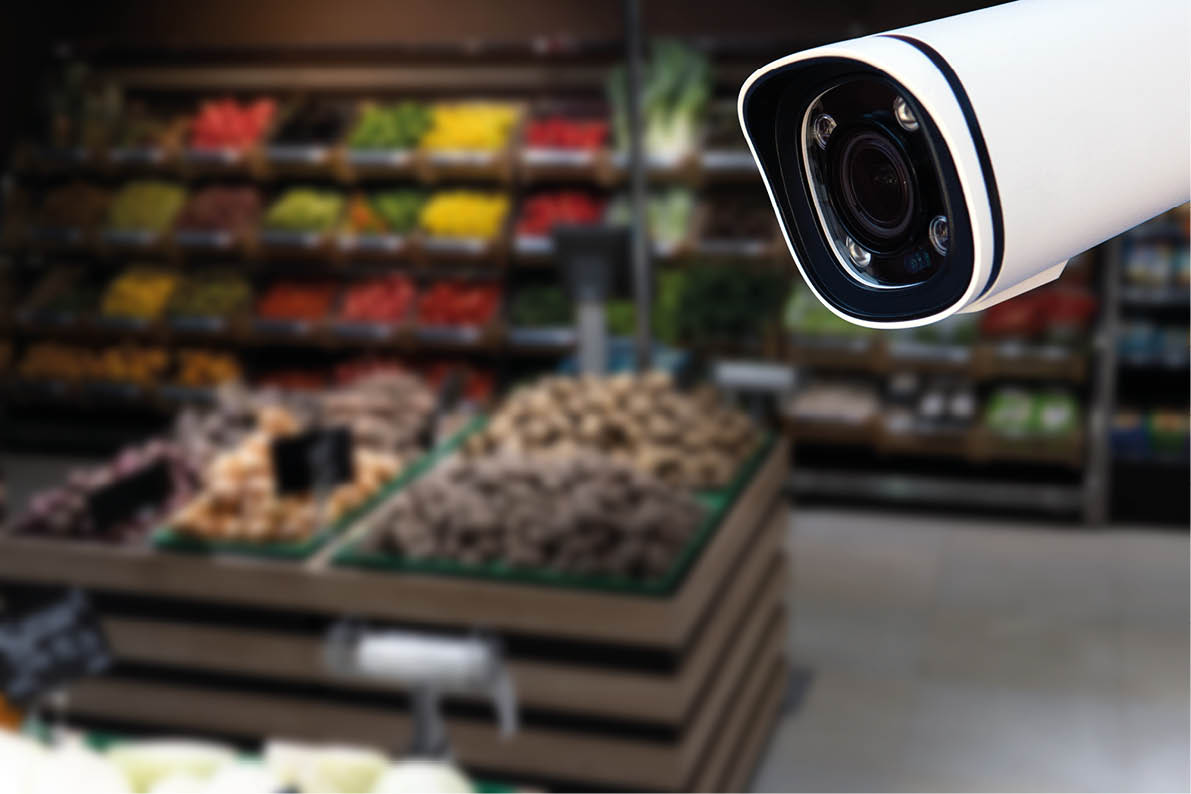 CCTV camera system security in shopping mall supermarket blur background.