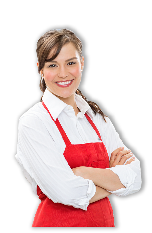 Portrait of confident female butcher standing arms crossed with colleagues in background