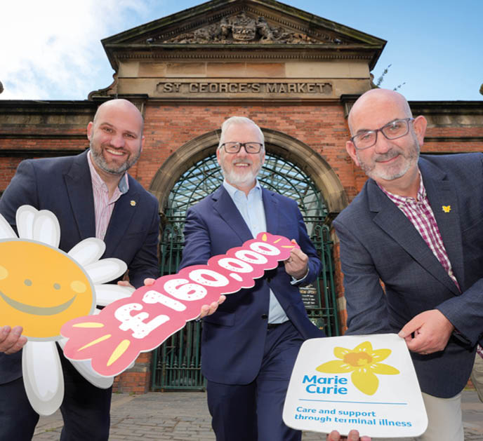 Henderson Group Sales and Marketing Director, Paddy Doody (centre) with Phil Alexander, CEO at Cancer Fund for Children (left) and Conor O’Kane, Partnership Manager at Marie Curie NI, celebrating the £160,000 raised by SPAR NI throughout their 60th anniversary year in 2021. 