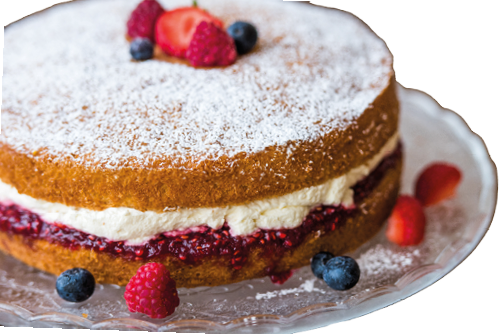 Mouth watering Victoria Sponge cake on a tray in a cafe