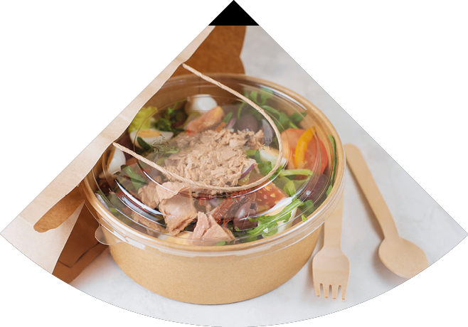 Fish diet salad with tuna, tomatoes, arugula on light background. Healthy vegetarian lunch. Concept eco restaurant delivery, environment protection. Take away food in brown paper craft plate. 