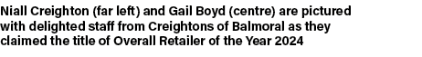 Niall Creighton (far left) and Gail Boyd (centre) are pictured with delighted staff from Creightons of Balmoral as th...