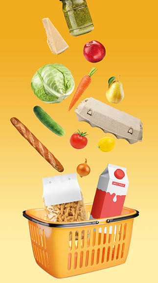Yellow shopping basket with fresh food full of variety of grocery products, food and drink on yellow background. Supermarket food concept. Home delivery. Food ingredient float. Flying concept.