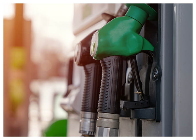 Close up of diesel and petrol fuel pistols at a gas station. The fuel crisis continues and the cost of fuel is going up