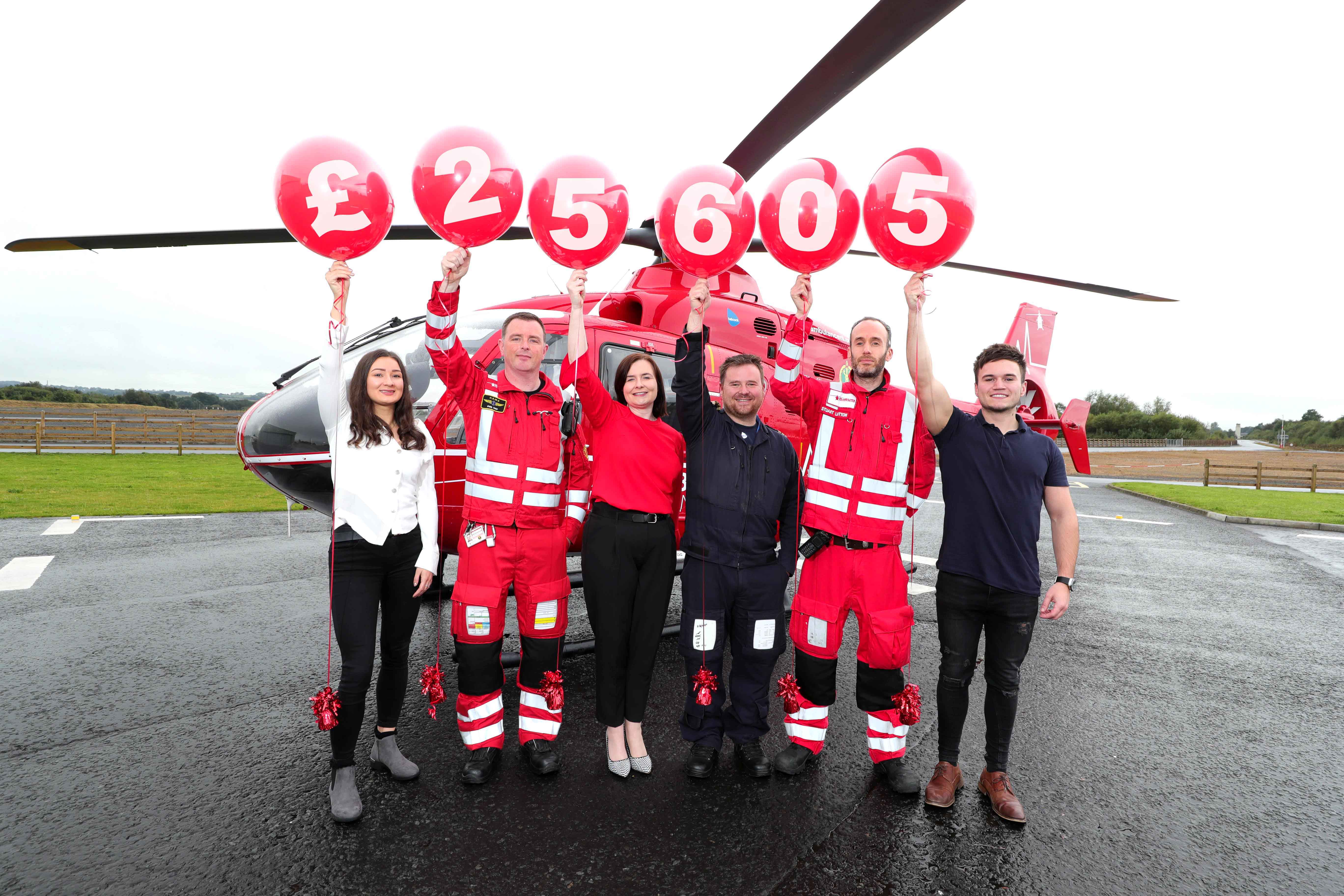Air Ambulance NI receives £25k Boost from soft drink giant